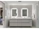 Luxurious bathroom with dual sinks, marble accents, and custom lighting at 3107 Peachtree Ne Rd # 1403, Atlanta, GA 30305