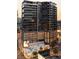 Contemporary high-rise building featuring multiple stories and expansive glass balconies at 3107 Peachtree Ne Rd # 1403, Atlanta, GA 30305