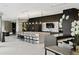 Expansive kitchen features a large island, modern appliances, and a sleek design at 3107 Peachtree Ne Rd # 1403, Atlanta, GA 30305