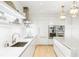 Kitchen featuring an island with seating, stainless steel appliances, and lots of counter space at 3107 Peachtree Ne Rd # 1403, Atlanta, GA 30305
