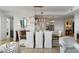 Inviting living room featuring hardwood floors, neutral decor, and modern lighting fixtures at 3107 Peachtree Ne Rd # 1403, Atlanta, GA 30305