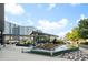 Attractive outdoor lounge space with water feature, seating, and lush landscaping at 3107 Peachtree Ne Rd # 1403, Atlanta, GA 30305
