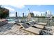 Stylish pool deck featuring comfortable lounge chairs and stunning city vistas at 3107 Peachtree Ne Rd # 1403, Atlanta, GA 30305