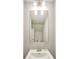 Bathroom featuring a vanity, mirror, modern lighting, and neutral wall color at 89 Little Magnolia Ln, Auburn, GA 30011