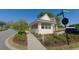 Charming exterior view featuring manicured landscaping, well-maintained property, and inviting curb appeal, located at 10th and Arnold Poplar at 89 Little Magnolia Ln, Auburn, GA 30011