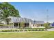 View of light colored modern building exteriors along a road at 89 Little Magnolia Ln, Auburn, GA 30011