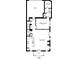 First floor plan features open living area, kitchen, primary bedroom with ensuite, and garage at 89 Little Magnolia Ln, Auburn, GA 30011
