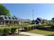 Picturesque street view featuring well-maintained landscaping, diverse home styles, and a welcoming neighborhood ambiance at 89 Little Magnolia Ln, Auburn, GA 30011