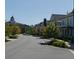 Attractive neighborhood street view with tree-lined streets, sidewalks, and various architectural styles, fostering community appeal at 89 Little Magnolia Ln, Auburn, GA 30011