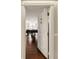 Elegant entrance featuring a paneled front door that opens to a view of a baby grand piano at 2479 Peachtree Ne Rd # 1805, Atlanta, GA 30305