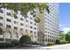Modern high-rise building featuring multiple windows and well-maintained landscaping at 2479 Peachtree Ne Rd # 1805, Atlanta, GA 30305