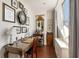 Bright home office featuring an antique desk, ample natural light, and unique wall decor at 2479 Peachtree Ne Rd # 1805, Atlanta, GA 30305