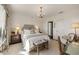 Elegant main bedroom with a chandelier, comfortable seating, and a tranquil atmosphere at 2479 Peachtree Ne Rd # 1805, Atlanta, GA 30305