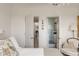 Bright main bedroom showcasing a glimpse of the bathroom and other living spaces at 2479 Peachtree Ne Rd # 1805, Atlanta, GA 30305