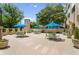 Community patio area with outdoor seating, dining tables, and well-maintained greenery at 2479 Peachtree Ne Rd # 1805, Atlanta, GA 30305