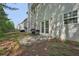 Spacious backyard area with a concrete patio, perfect for grilling and enjoying outdoor living with access to the home at 415 Clairidge Sw Ln, Lawrenceville, GA 30046