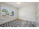 Bedroom featuring carpet floors, white walls, and a window at 415 Clairidge Sw Ln, Lawrenceville, GA 30046