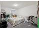 Bedroom featuring carpet floors, white walls, and a TV at 415 Clairidge Sw Ln, Lawrenceville, GA 30046