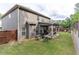 Outdoor living with a covered patio, seating, and fenced yard, perfect for entertaining guests at 180 Cleburne, Acworth, GA 30101