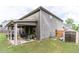 Spacious backyard with a covered patio area, convenient storage shed, and a well-maintained lawn at 180 Cleburne, Acworth, GA 30101
