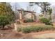 Bentleigh Station community sign surrounded by landscaped greenery at 180 Cleburne, Acworth, GA 30101