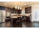Modern kitchen featuring stainless steel appliances, dark cabinetry, and center island at 180 Cleburne, Acworth, GA 30101