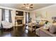 Cozy living room featuring a stone fireplace, plush seating, and large windows at 180 Cleburne, Acworth, GA 30101