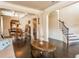 Elegant living room with hardwood floors, wainscoting, and coffered ceiling detail near dining area at 180 Cleburne, Acworth, GA 30101