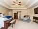 Spacious main bedroom suite features a tray ceiling, sitting area, and ensuite bathroom at 180 Cleburne, Acworth, GA 30101