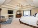 Large main bedroom featuring a tray ceiling, sitting area, and ample natural light at 180 Cleburne, Acworth, GA 30101