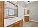 Bathroom showcasing a tub, vanity, and neutral walls at 308 Jessica Way, Canton, GA 30114