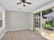Bright carpeted bedroom with access to the backyard at 308 Jessica Way, Canton, GA 30114