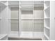 Walk-in closet with multiple shelves and hanging racks at 308 Jessica Way, Canton, GA 30114