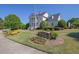 Summer Club house with manicured lawn and stone signage at 308 Jessica Way, Canton, GA 30114