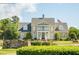 Community clubhouse with manicured landscaping and stone signage at 308 Jessica Way, Canton, GA 30114