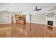 Spacious open-concept kitchen with an island and a fireplace flowing to the living area at 308 Jessica Way, Canton, GA 30114