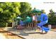 A vibrant playground featuring slides, a climbing structure, and a shaded area for enjoyment at 308 Jessica Way, Canton, GA 30114