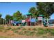 Community playground with multiple slides, climbing structures, and swings for outdoor fun and recreation at 308 Jessica Way, Canton, GA 30114
