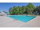 Large community pool with zero entry, lounge chairs, and a play structure at 308 Jessica Way, Canton, GA 30114