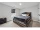 Neutral carpeted bedroom with a great view of the outdoors and plenty of light at 3638 Silvery Way, Powder Springs, GA 30127