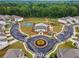 An aerial view shows community amenities, including a pool, tennis courts, and a playground at 3638 Silvery Way, Powder Springs, GA 30127