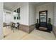 Welcoming front porch with elegant seating, potted plants, and a stylish black front door at 3638 Silvery Way, Powder Springs, GA 30127