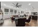 Open-concept living room with modern furnishings, connecting seamlessly to the kitchen and dining areas at 3638 Silvery Way, Powder Springs, GA 30127