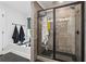 This main bathroom has a beautiful glass shower with dark gray tiling at 3638 Silvery Way, Powder Springs, GA 30127