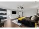 Bright main bedroom with a ceiling fan and access to a bathroom and closet at 3638 Silvery Way, Powder Springs, GA 30127