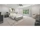 Bright, airy bedroom with a ceiling fan, large window, and neutral decor at 3990 Clifton Hill Court #9, Cumming, GA 30040
