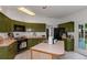 Functional kitchen with a center island, ample counter space, and modern appliances perfect for cooking and meal preparation at 577 Mountain Oaks Pkwy, Stone Mountain, GA 30087
