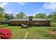 Backyard with stone path leading to raised deck at 690 Manor Ridge Sw Dr, Mableton, GA 30126