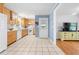 Well-lit kitchen with tile flooring, featuring modern appliances and ample storage space at 690 Manor Ridge Sw Dr, Mableton, GA 30126