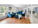 Spacious living room features hardwood floors, natural light, and comfortable seating at 690 Manor Ridge Sw Dr, Mableton, GA 30126